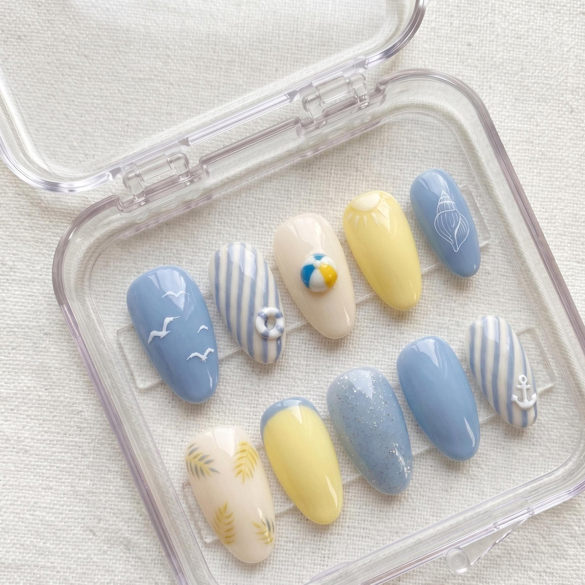 Coastal Blue and Yellow Beach Nail Set With Seashells and Wave Art