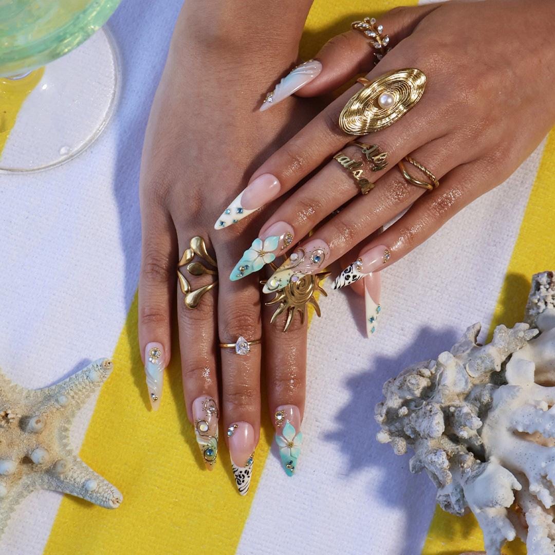 Coastal Summer Aqua Floral Nails with Gold Chrome Swirls, Zebra Tips and Blue Rhinestones