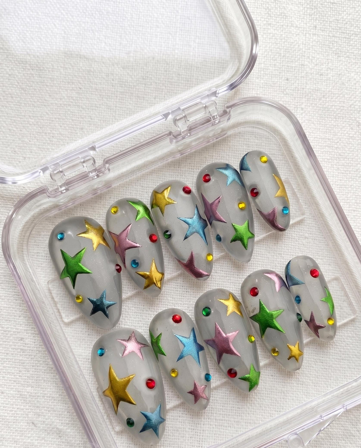 Colorful Raised Star Press On Nails With Milky Gray Base