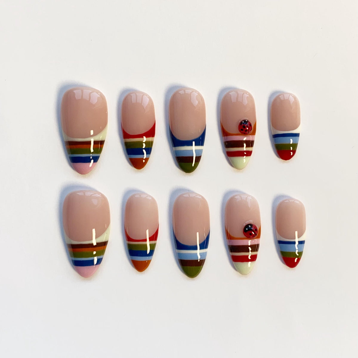 Colorful Striped French Tip Nails With Ladybug Accents