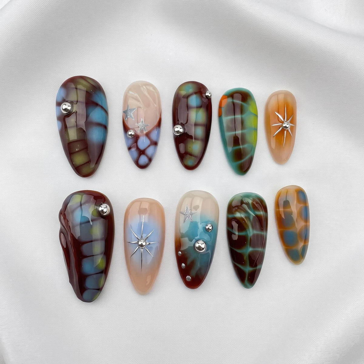 Cosmic Tortoiseshell Press-On Nails With Silver Starburst Accents