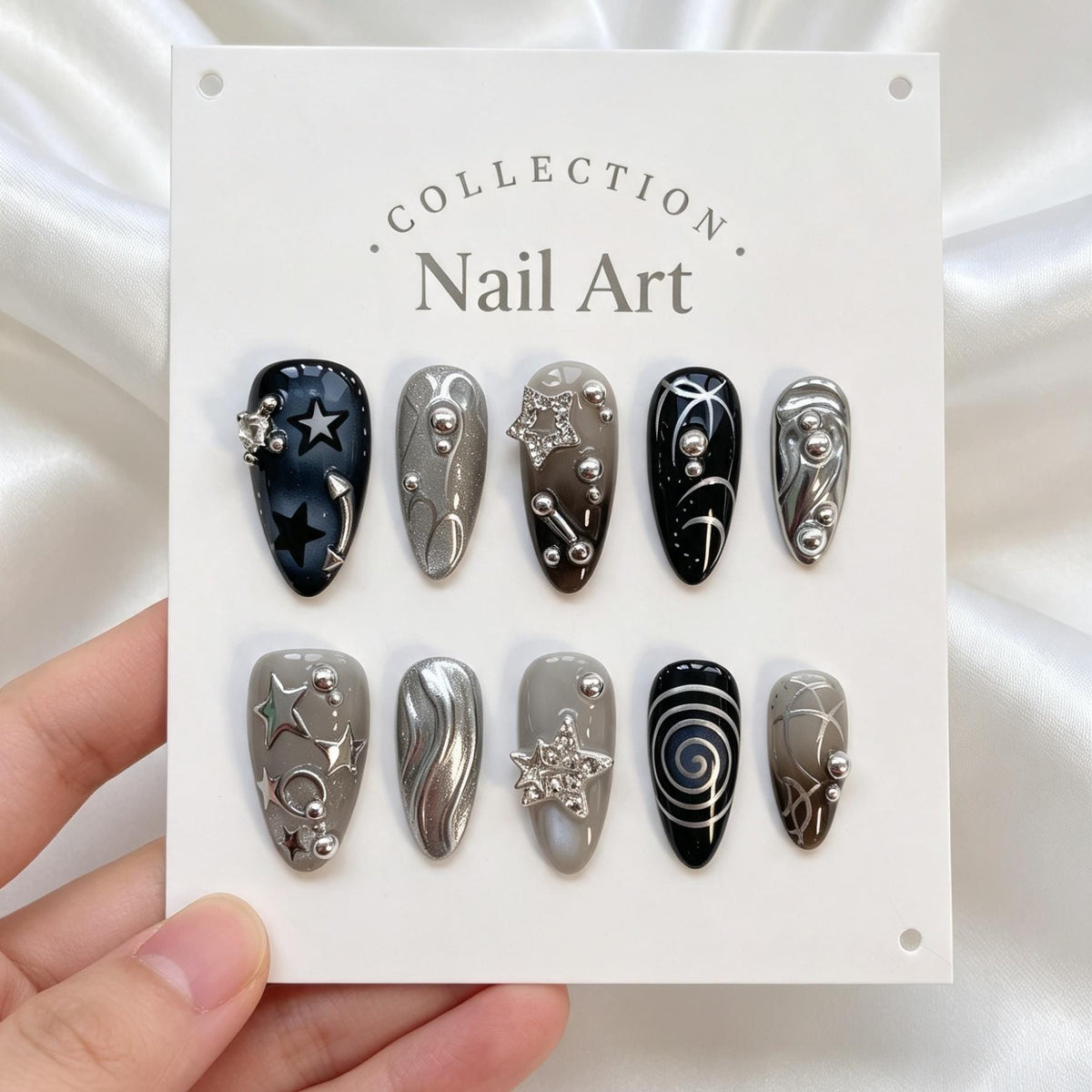 Dark Celestial Star and Moon Nails With Silver Chrome Swirls