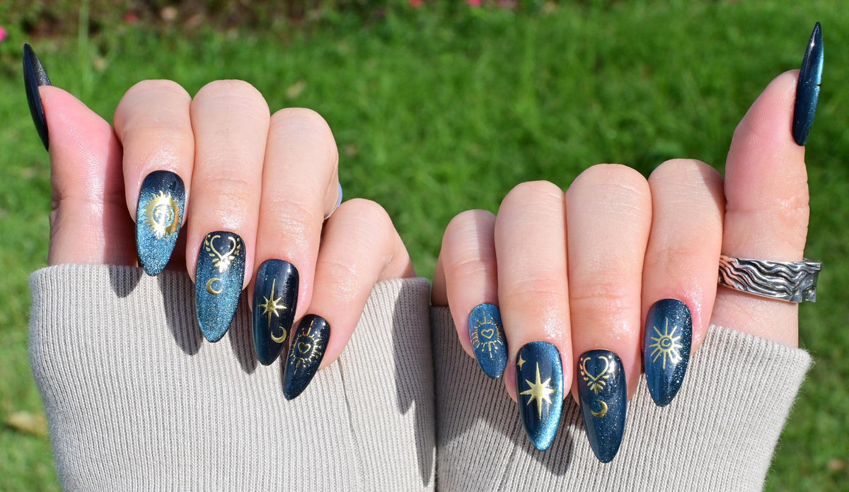 Dark Teal Cat Eye Celestial Nails with Gold Suns, Moons and Stars