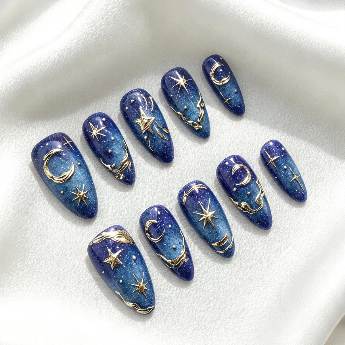 Deep Blue Celestial Press-On Nails With Gold Moons, Stars, and Shimmer