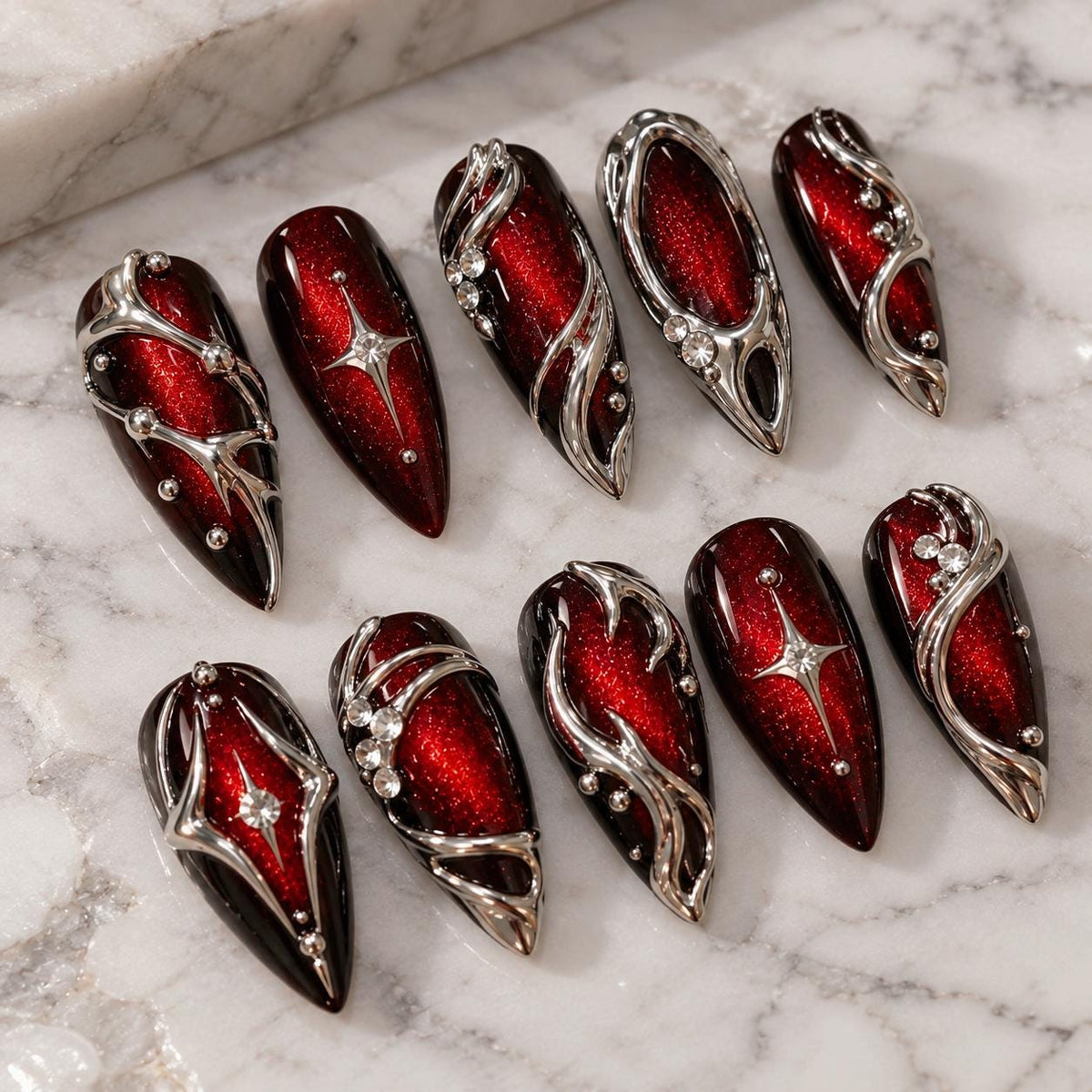 Deep Red Cat Eye Gothic Y2K Statement Nails With Raised Silver Swirls and Rhinestones
