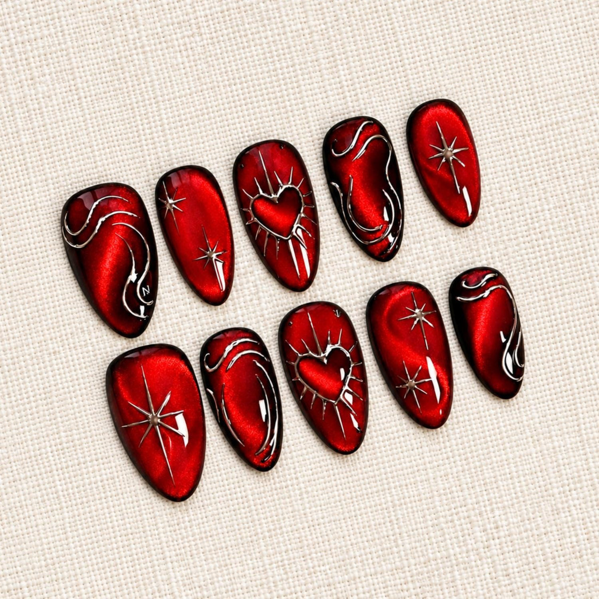 Deep Red Cat Eye Press On Nails with Silver Chrome Swirls, Starbursts and Hearts, Gothic Y2K
