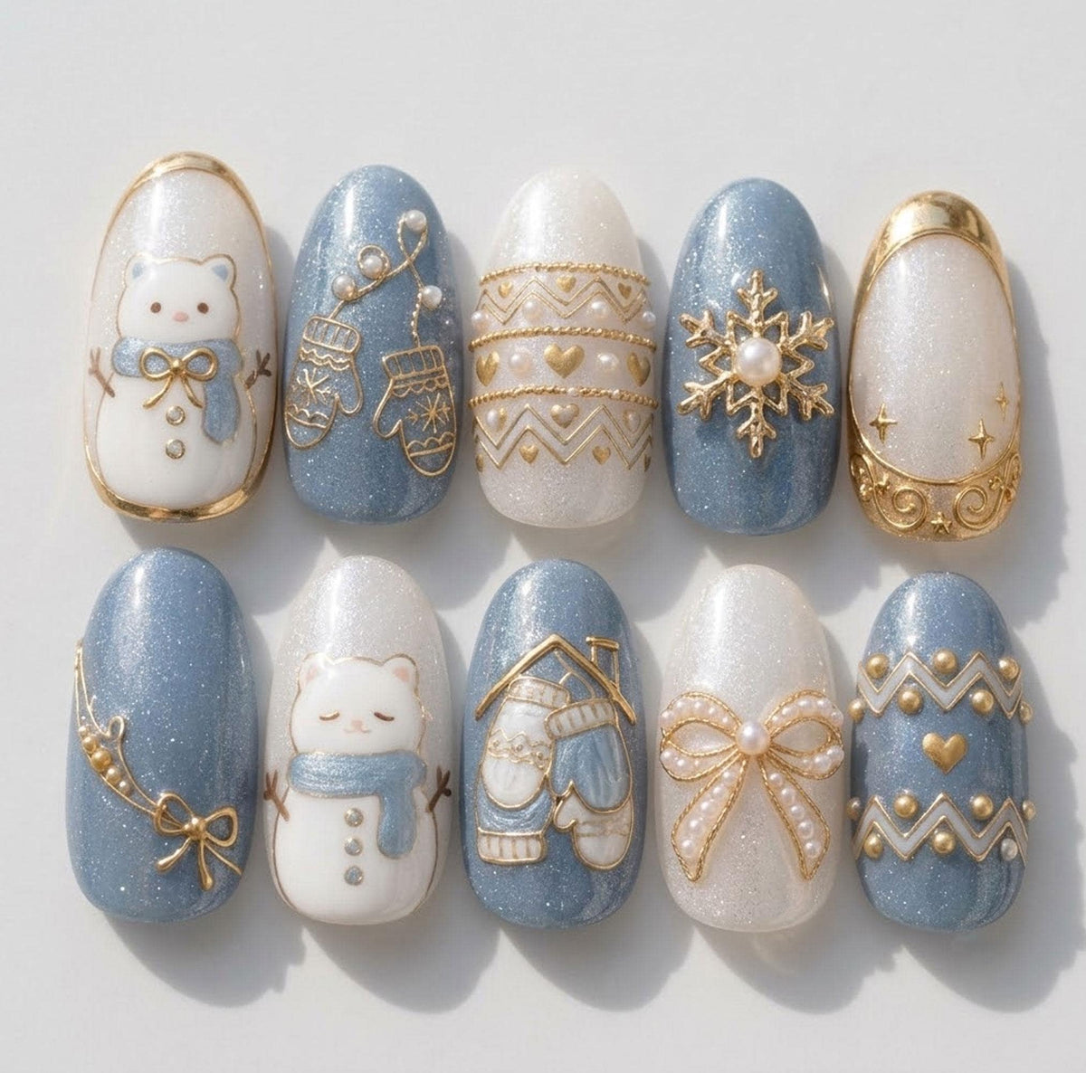 Dusty Blue Glitter and Pearl White Winter Nails with Snowmen, Mittens, and Gold Details