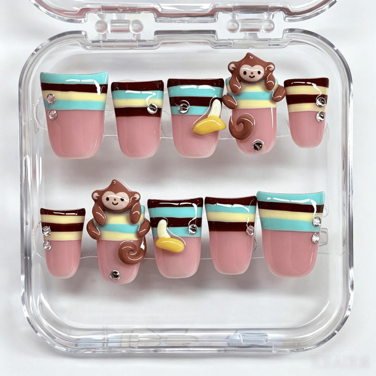 Dusty Pink Monkey and Banana Nails with Colorful Stripes and Rhinestones