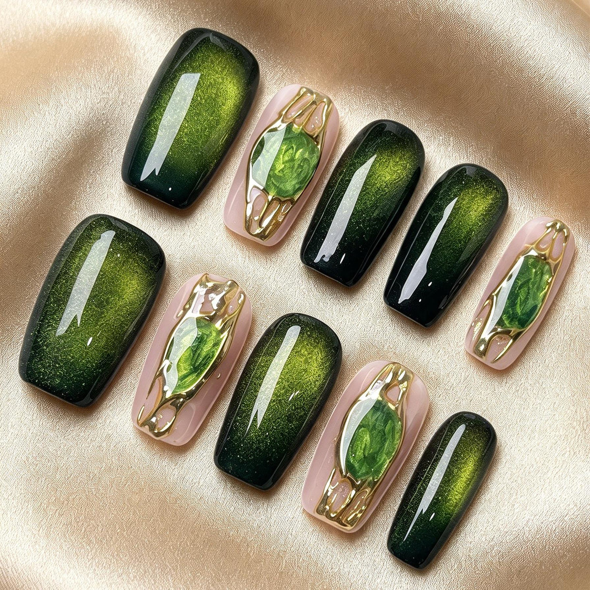 Emerald Green Cat Eye Nails With Gemstone Accents and Gold Frames