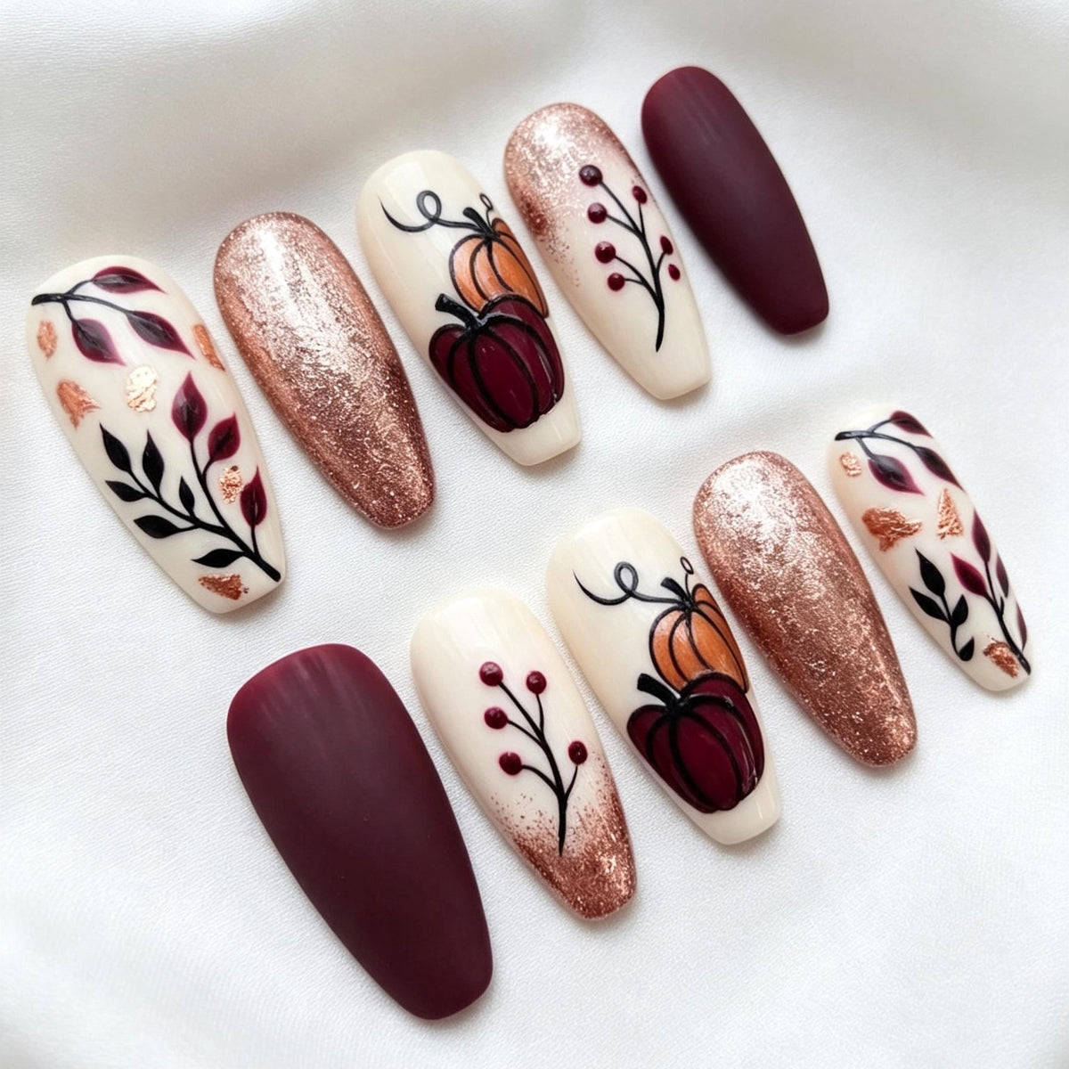 Fall Burgundy Pumpkin and Botanical Nails With Rose Gold Glitter