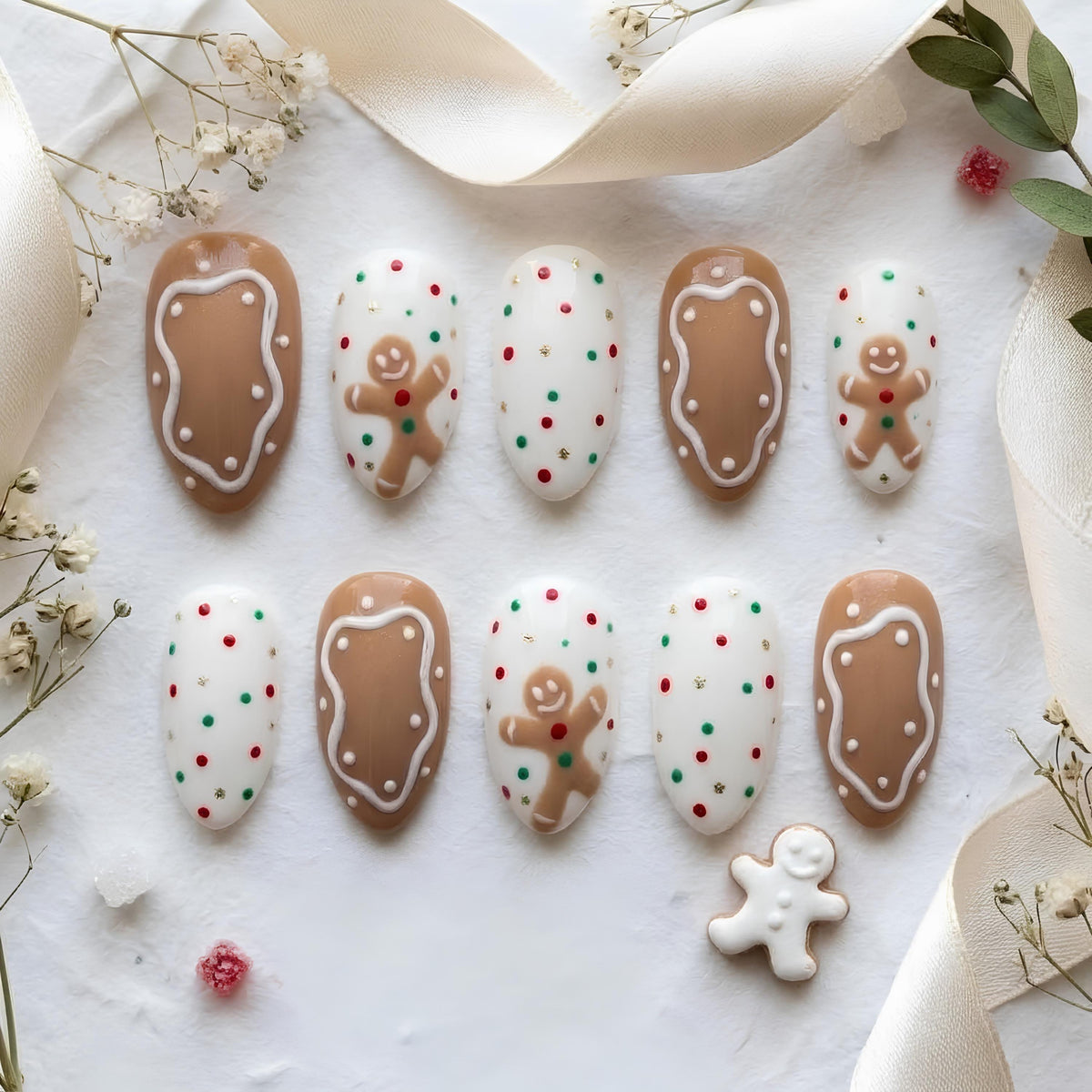 Gingerbread Man Nails With Icing Details and Festive Dots