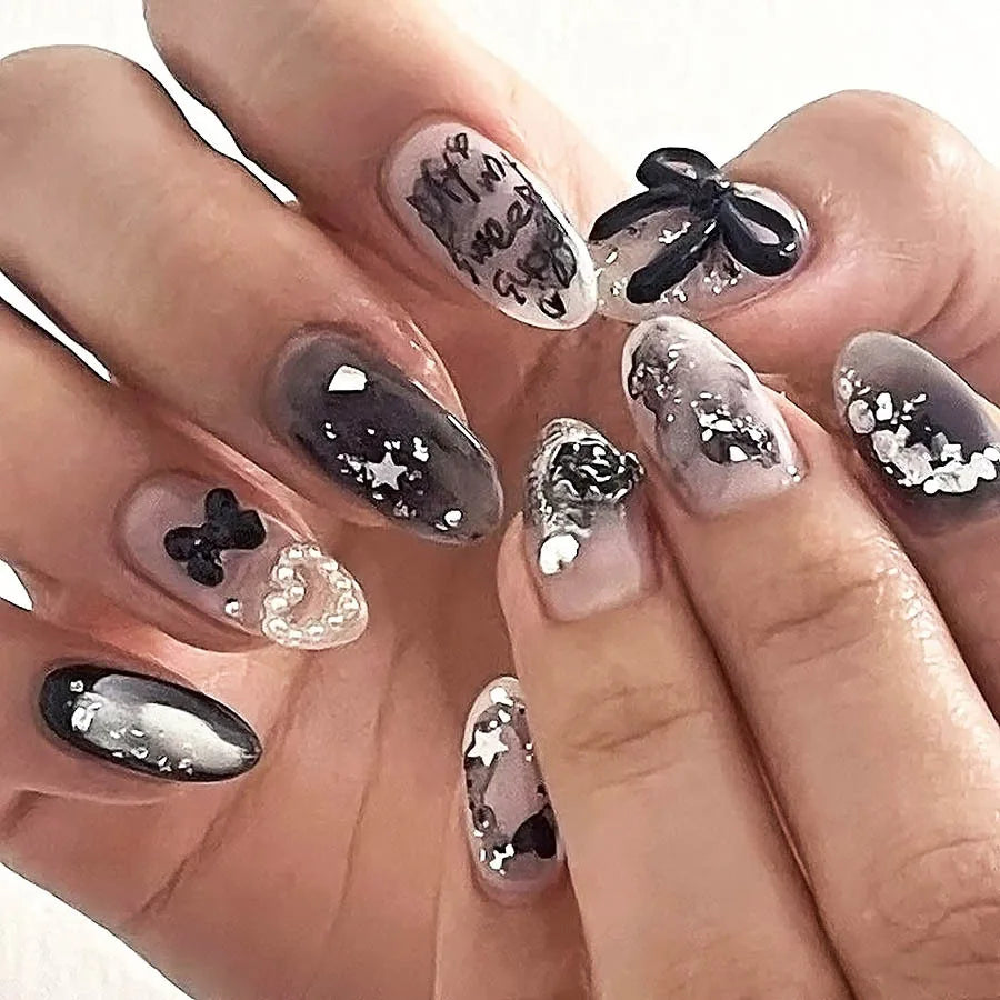 Glossy Black and Gray Nails With Silver Flecks, 3D Bow and Pearl Details