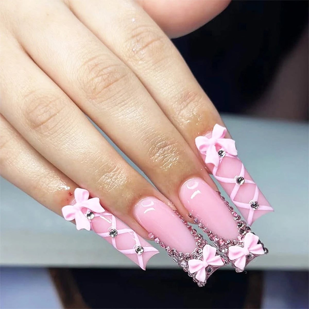 Glossy Pink French Tip Nails with 3D Bows and Rhinestones
