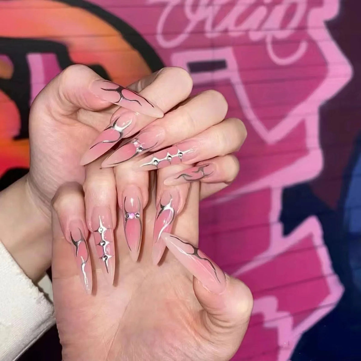 Gothic Blush Pink Nails with Silver Flames and Rhinestone Details