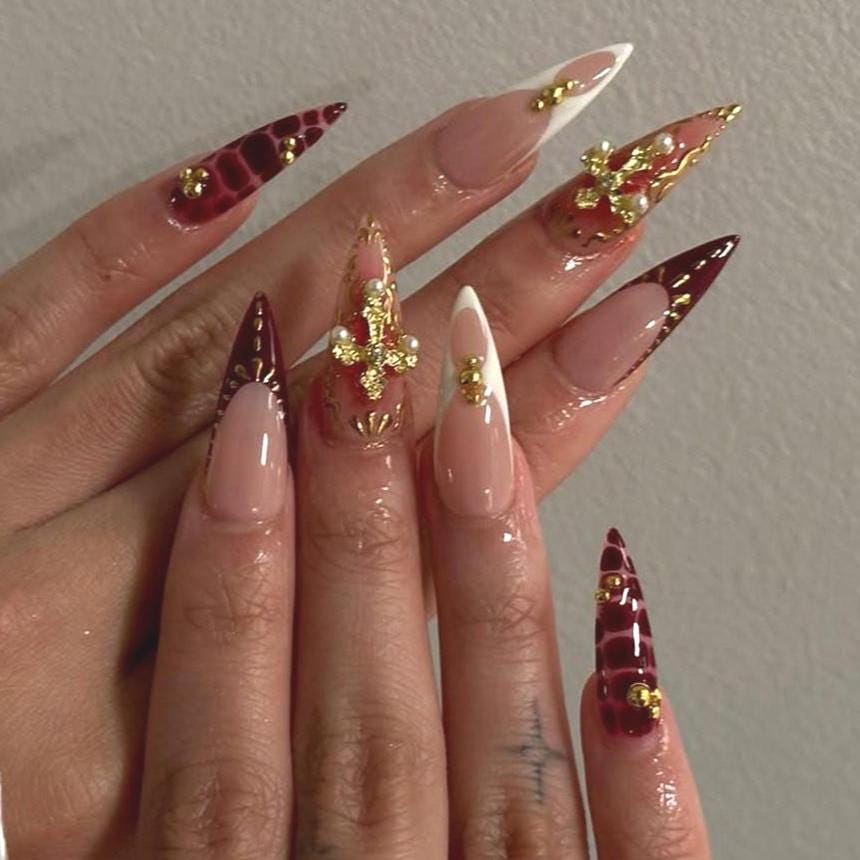 Gothic Burgundy and Nude Nails with Gold Cross and Rhinestone Details