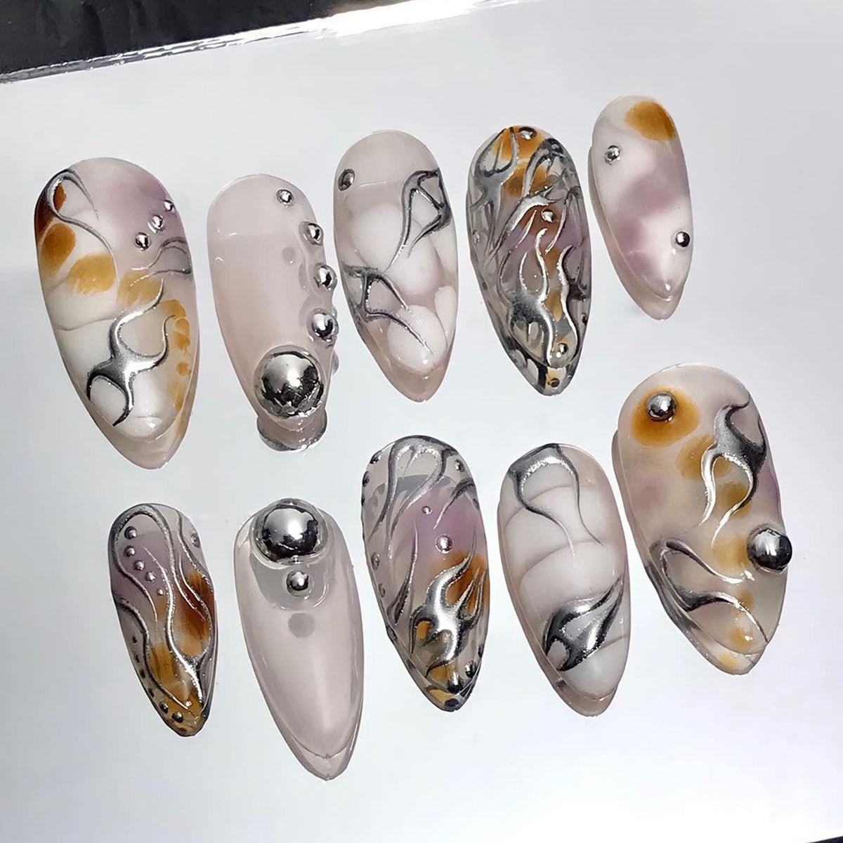 Gothic Punk Y2K Press-On Nails with Silver Swirls and Amber Accents