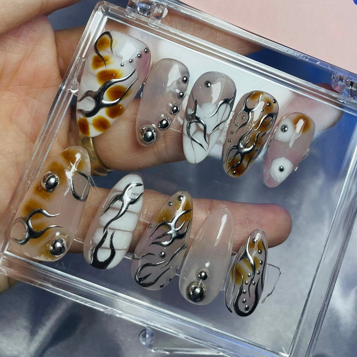 Gothic Punk Y2K Press-On Nails with Silver Swirls and Amber Accents
