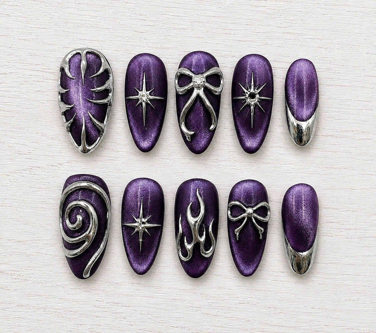 Gothic Y2K Purple Cat-Eye Chrome Nails With Silver Bows, Starbursts & French Tips