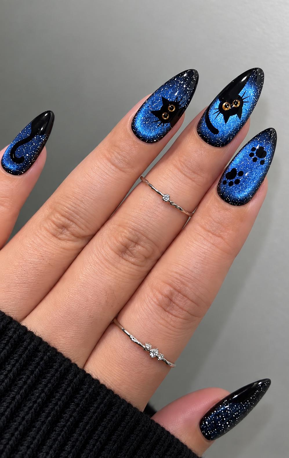 Halloween Blue Cat Eye Nails With Black Cats, Gold Eyes, and Paw Prints