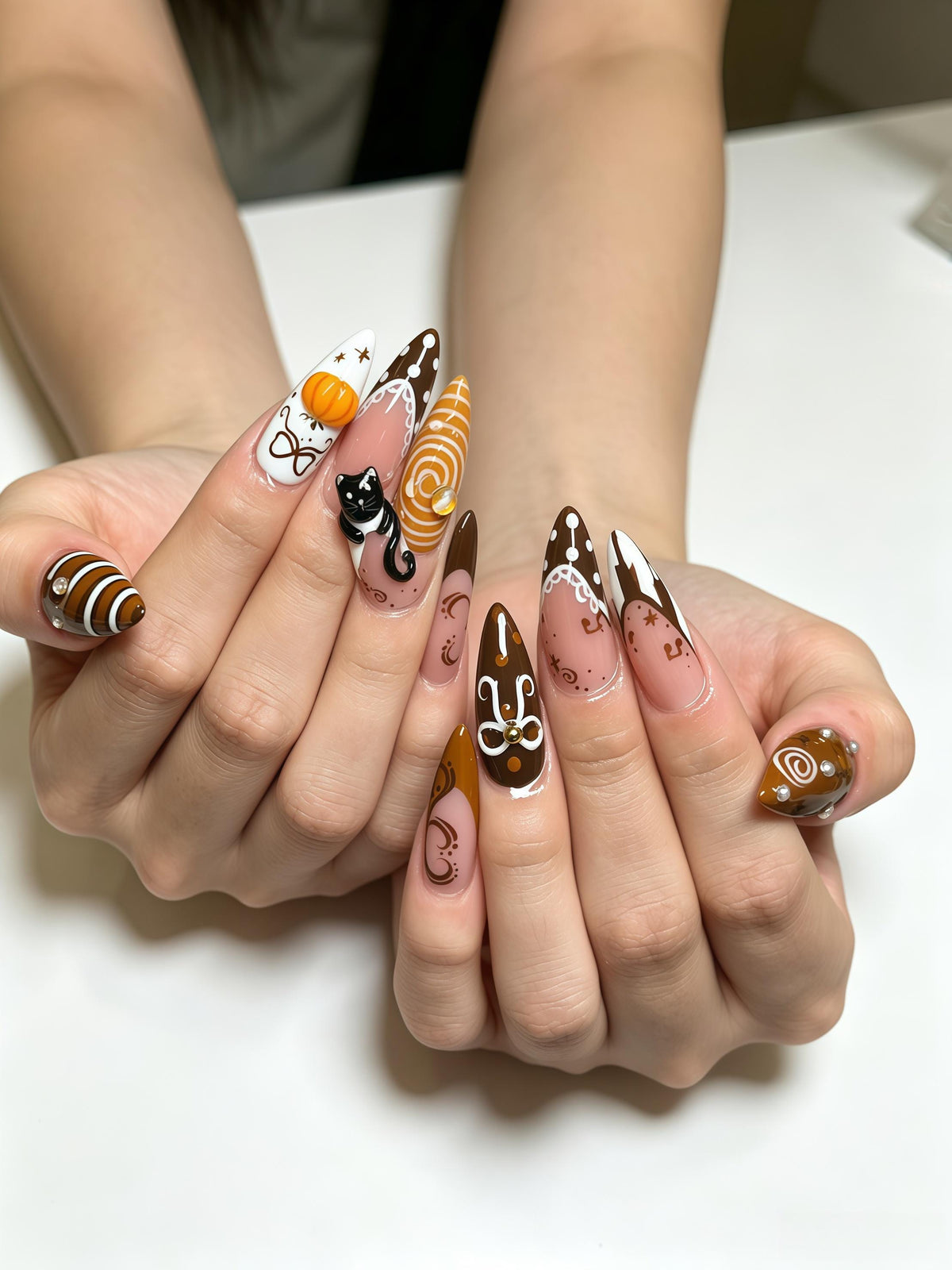 Halloween Cat and Pumpkin Nails with Brown Swirls and Bow Details
