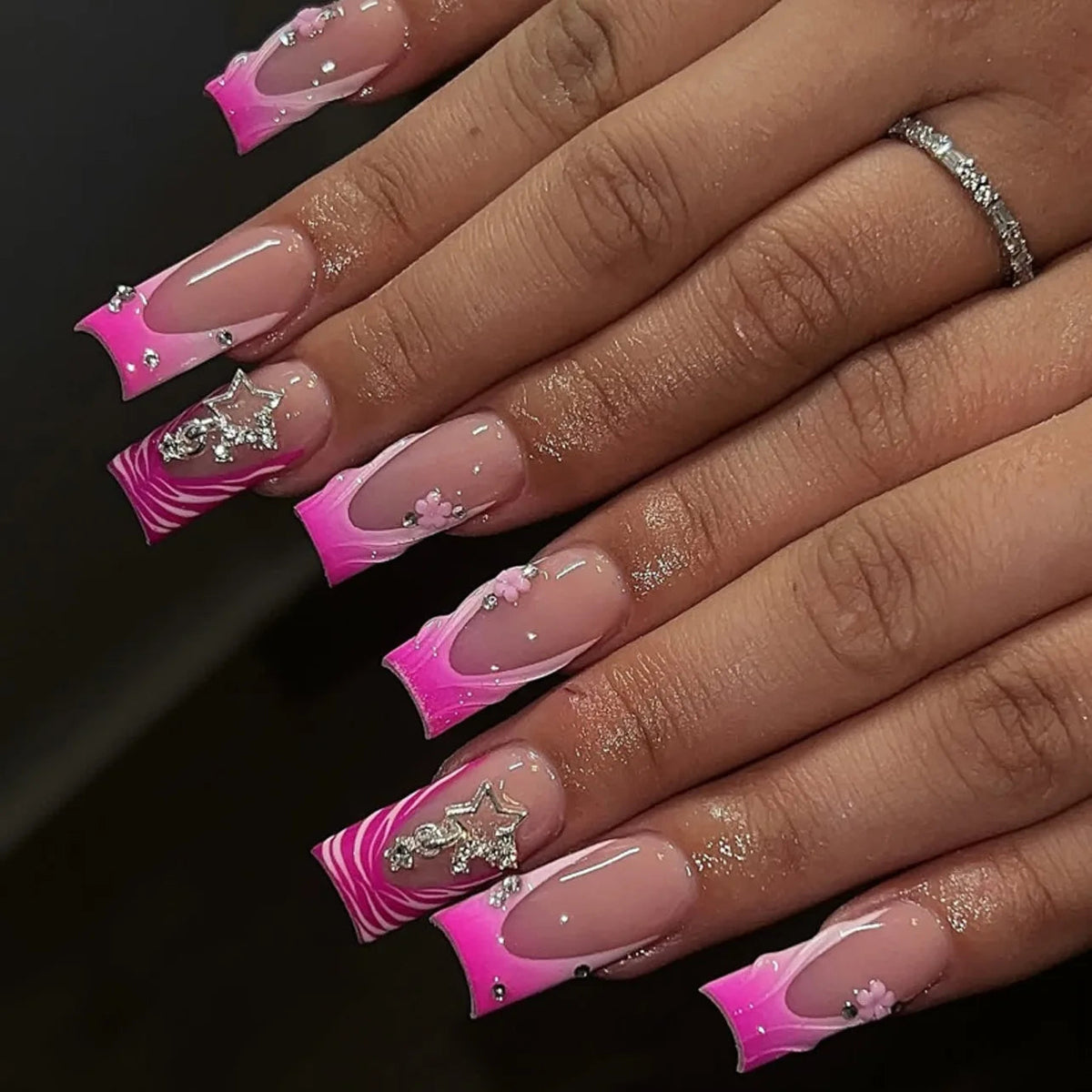 Hot Pink French Tip Nails With Rhinestones, Flowers and Silver Charms