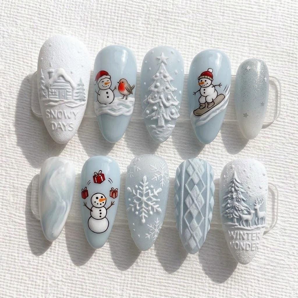 Icy Blue Christmas Press-On Nails With 3D Snowmen, Cabins, Trees, and Snowflakes