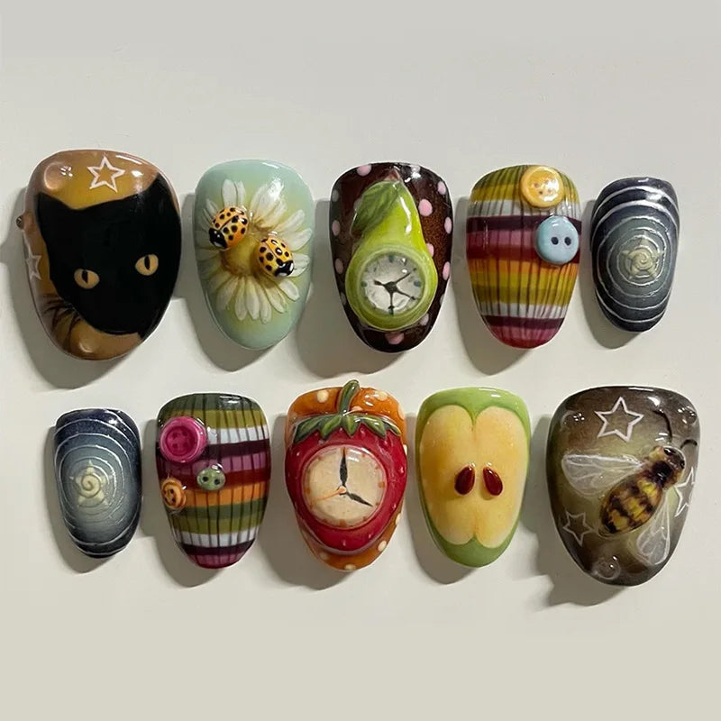 Illustrative Fruit and Insect Nail Set with Stripes, Spirals, and Raised Accents