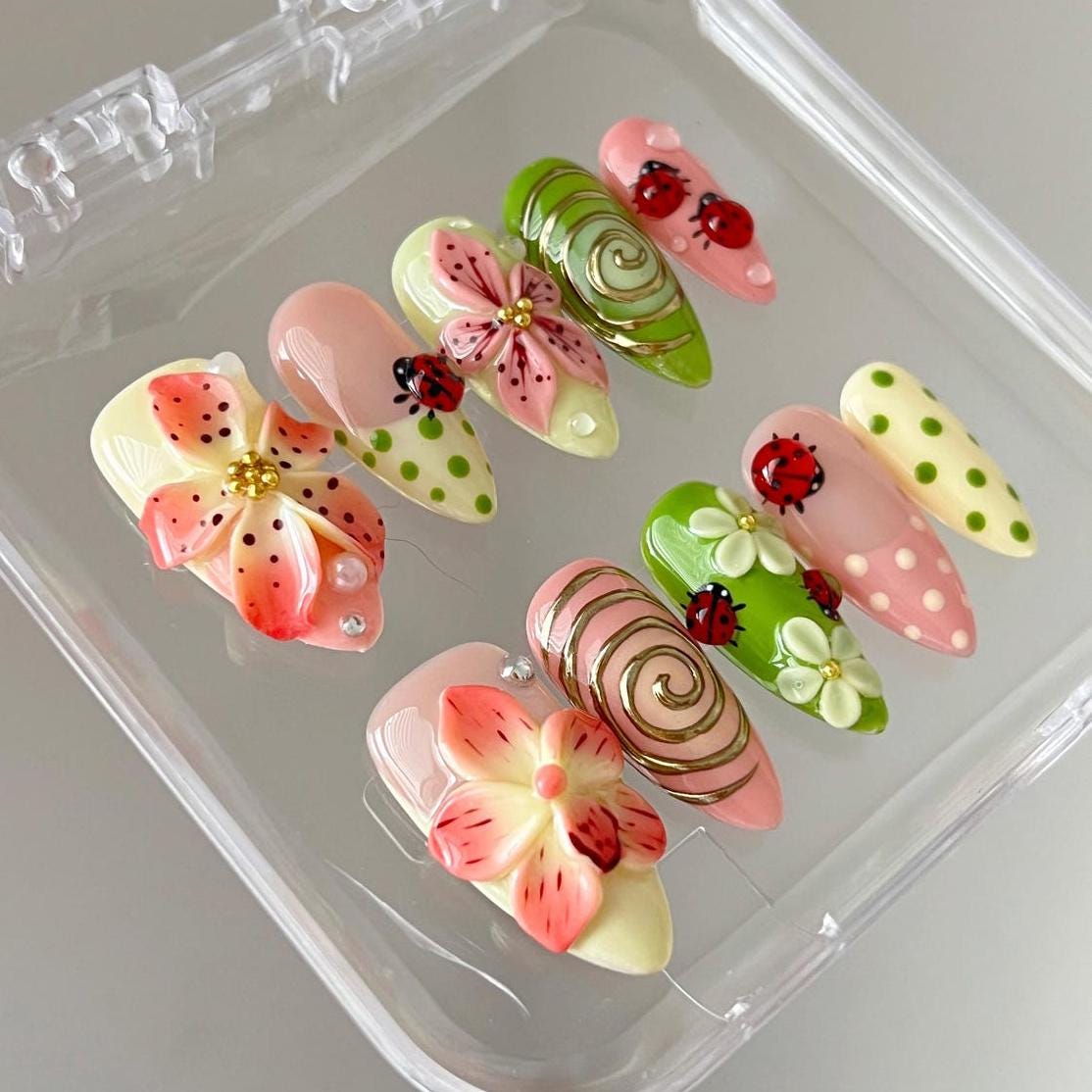 Ladybug and Raised Flower Press On Nails with Green Polka Dots and Gold Spirals