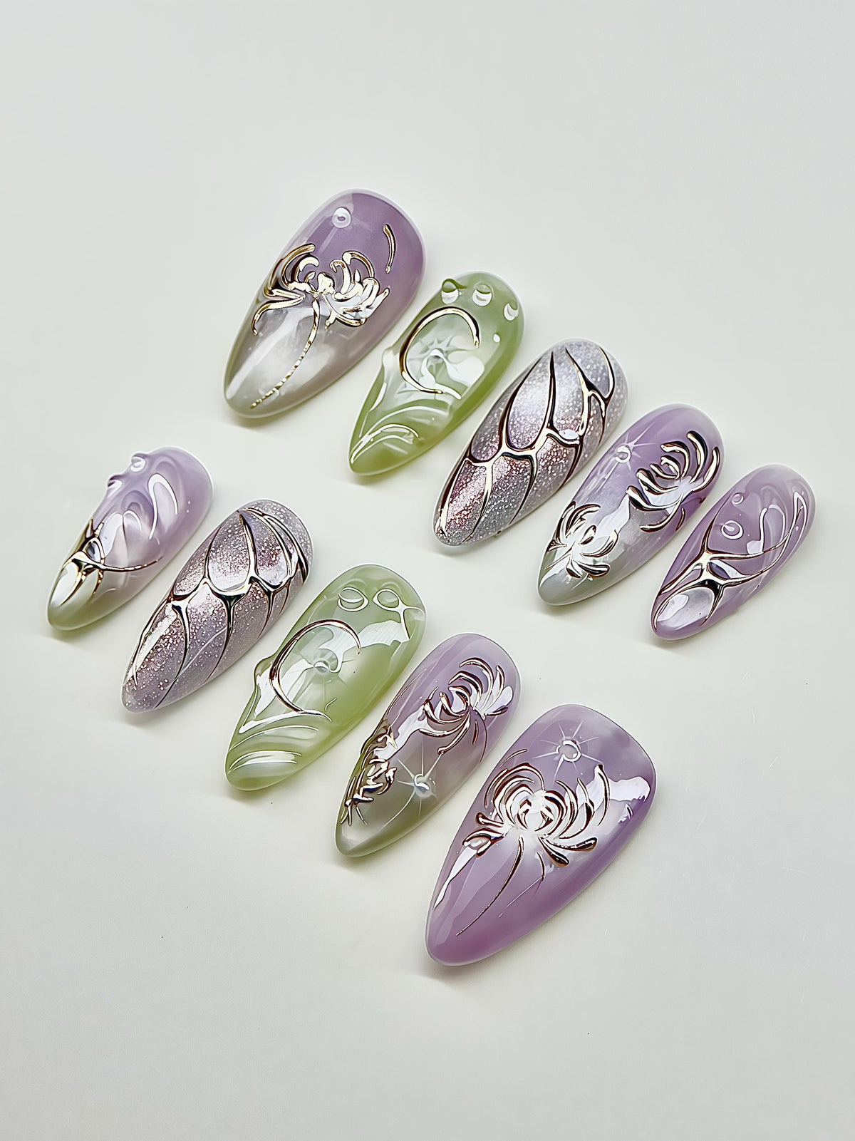 Lavender and Green Celestial Nails with Chrome Butterfly and Floral Details