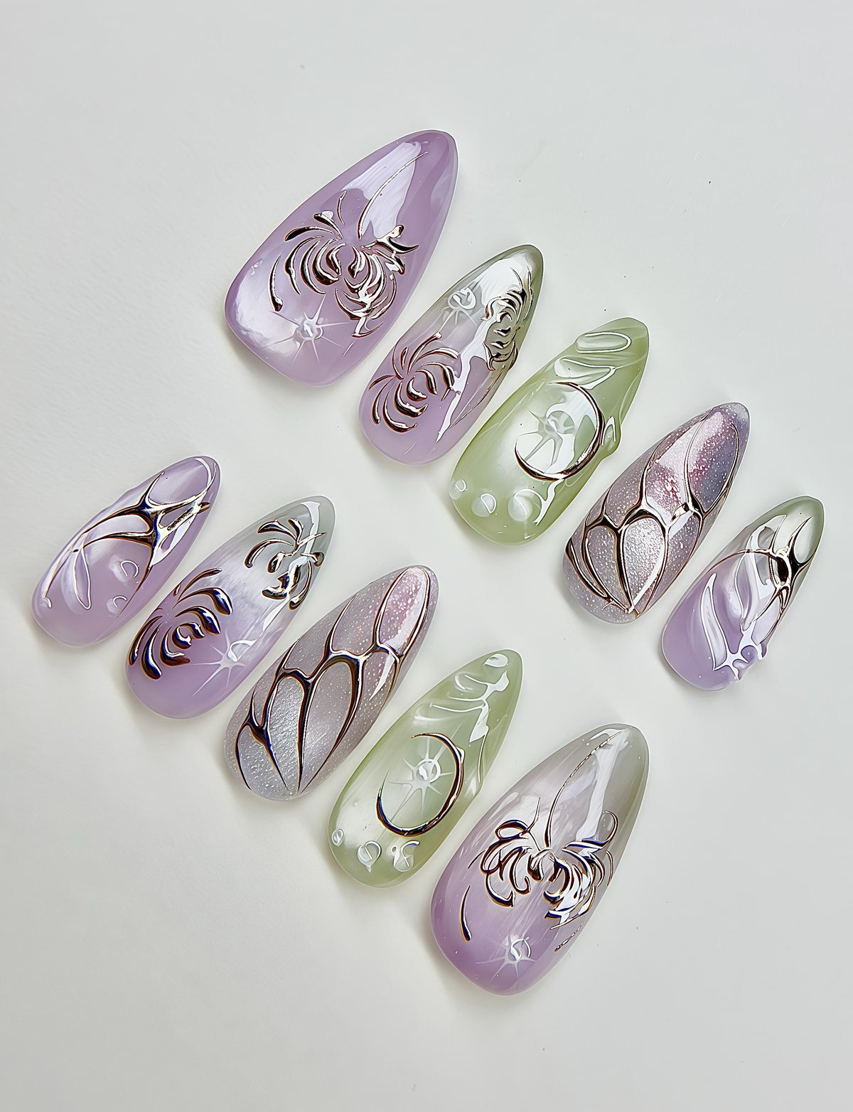 Lavender and Green Celestial Nails with Chrome Butterfly and Floral Details