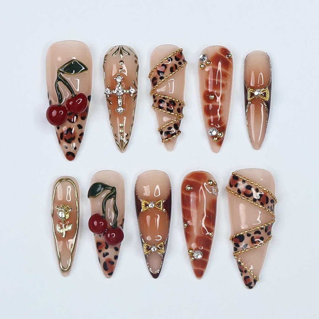 Leopard Print Cherry Nails with Gold Details and 3D Red Cherry Embellishments