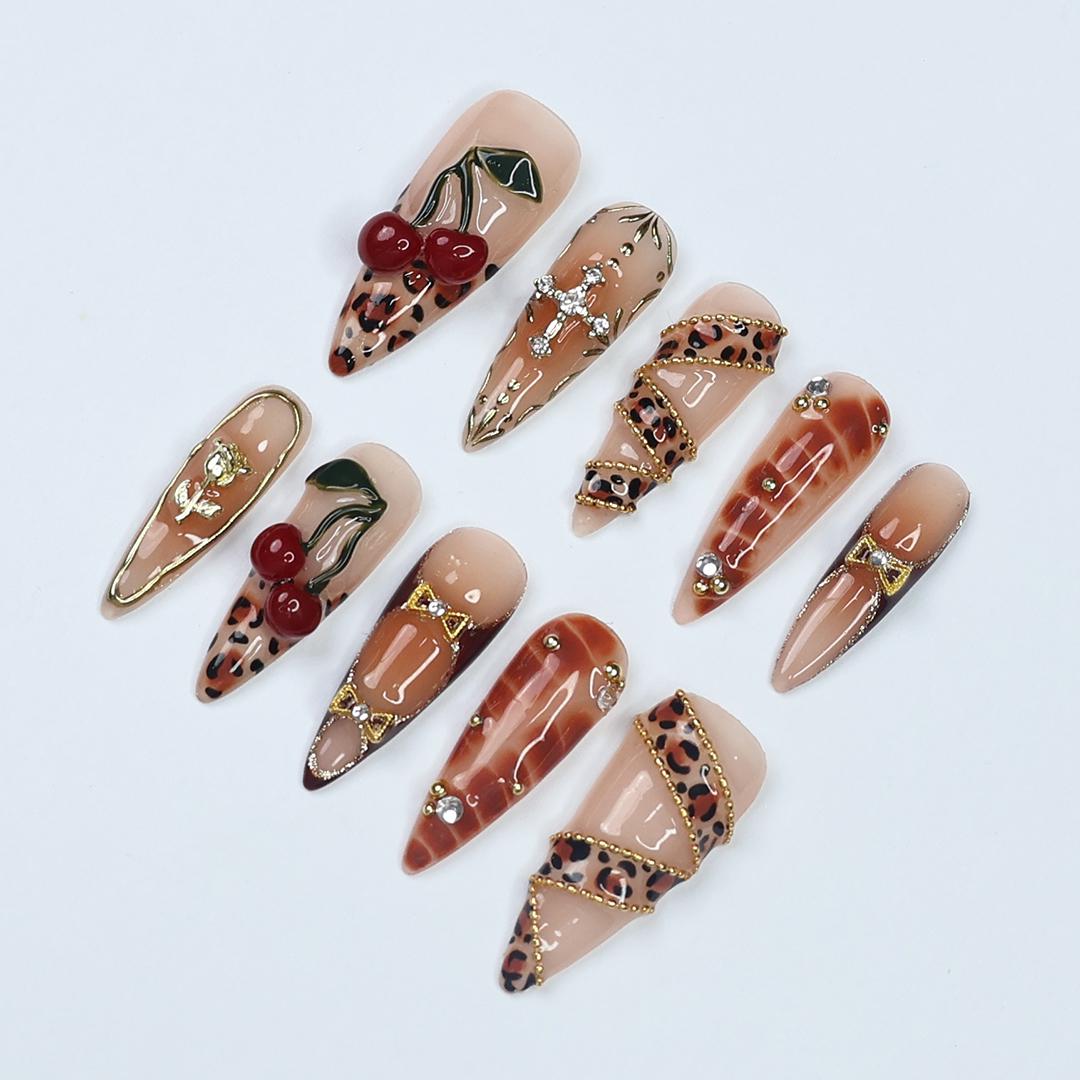 Leopard Print Cherry Nails with Gold Details and 3D Red Cherry Embellishments