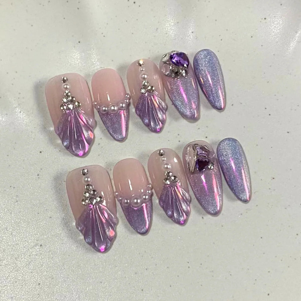 Lilac Cat-Eye French Tip Nails With Shell Charms and Rhinestones