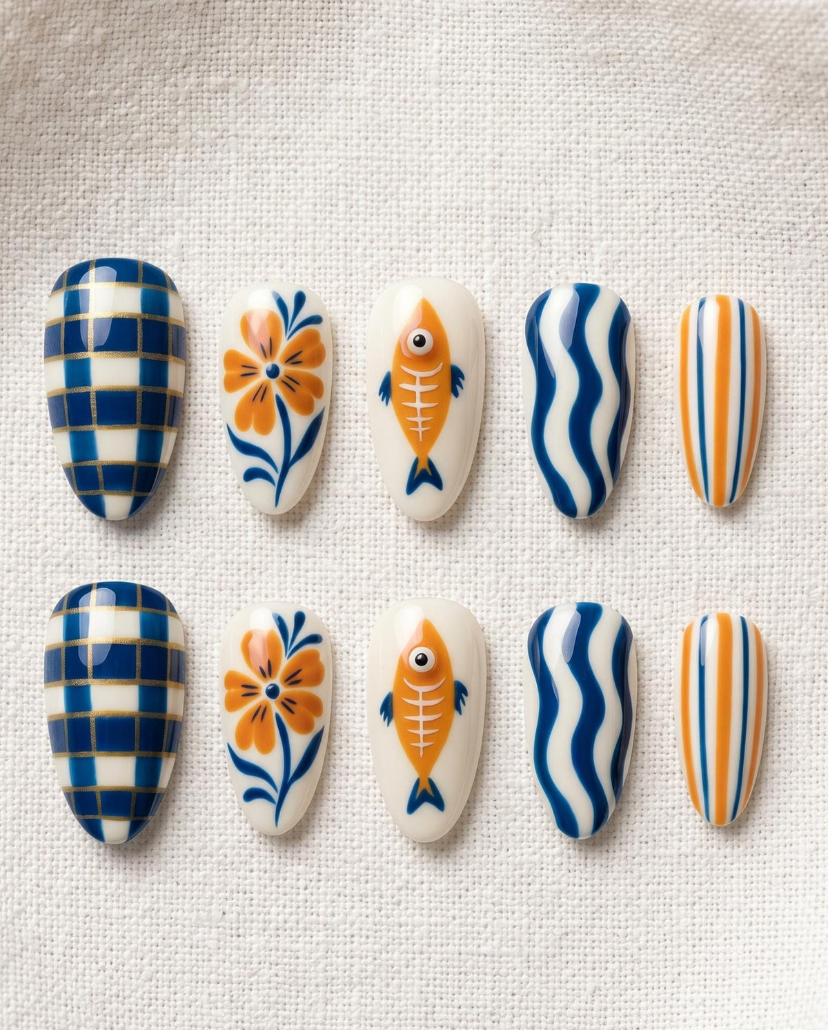 Mediterranean Fish and Floral Press On Nails in Blue, Orange, and Cream