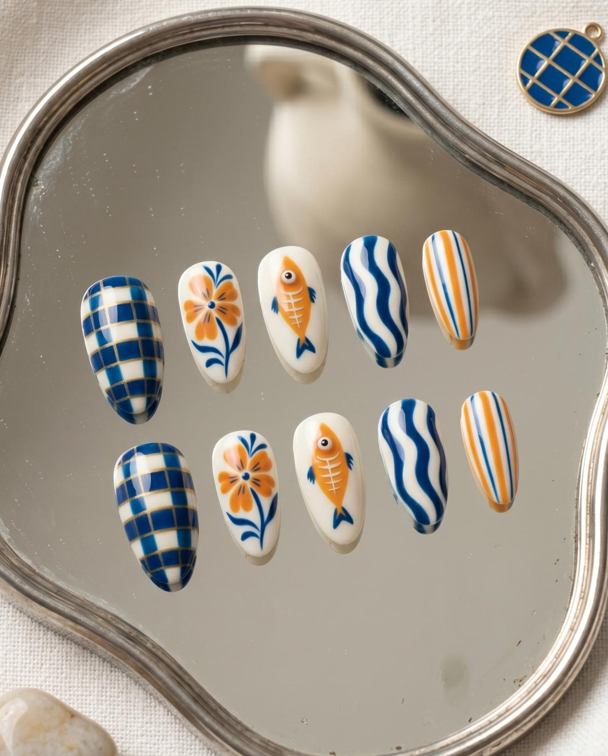 Mediterranean Fish and Floral Press On Nails in Blue, Orange, and Cream