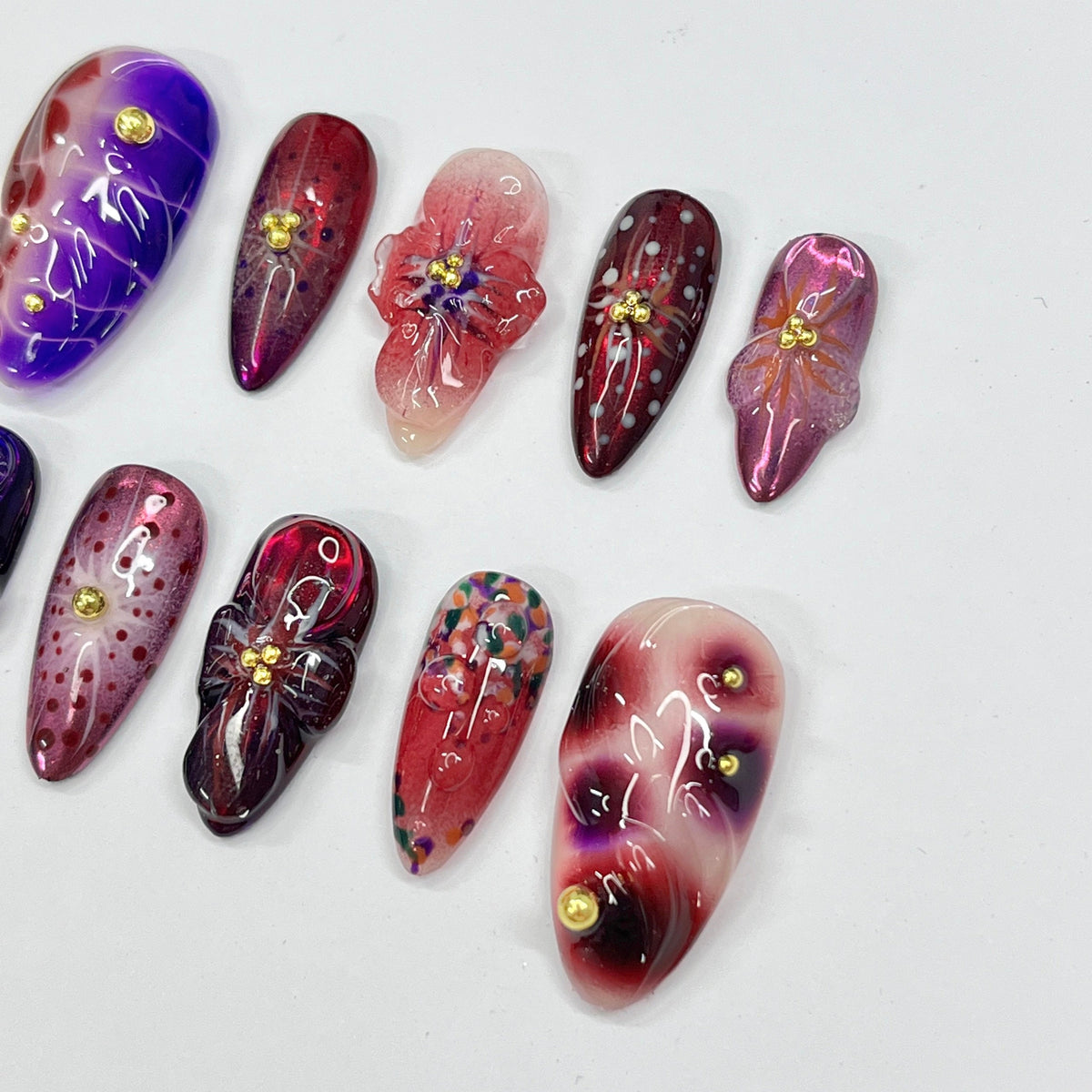 Midnight Blossom Floral Press On Nails With Marbled Colors, Raised Flowers, and Gold Details