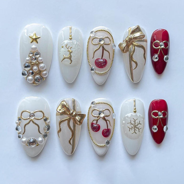 Milky White Christmas Press On Nails With Pearl Trees, Gold Bows, Cherries, and Reindeer
