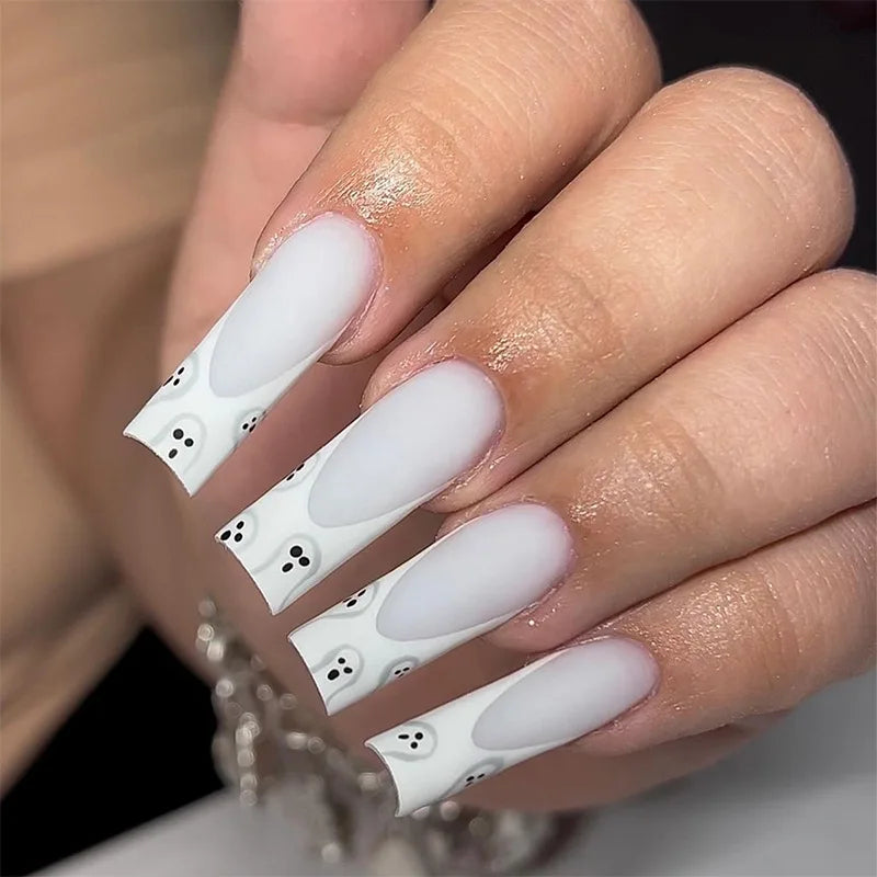 Milky White French Tip Nails with Black Ghost Face Motifs