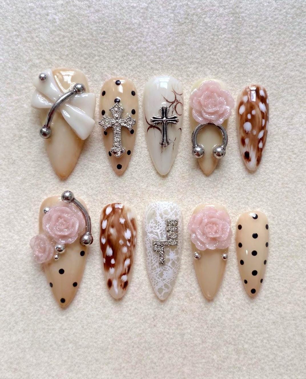 Nude and White Y2K Rose Press-On Nails With Tortoiseshell, Polka Dots, and Silver Details