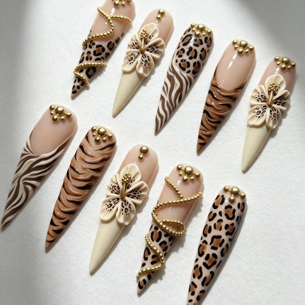 Nude Animal Print Nails With 3D Hibiscus Flowers and Gold Bead Details