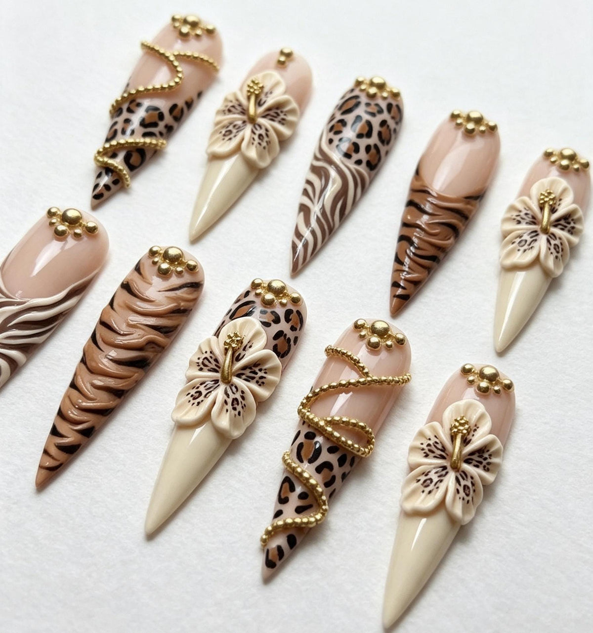 Nude Animal Print Nails With 3D Hibiscus Flowers and Gold Bead Details
