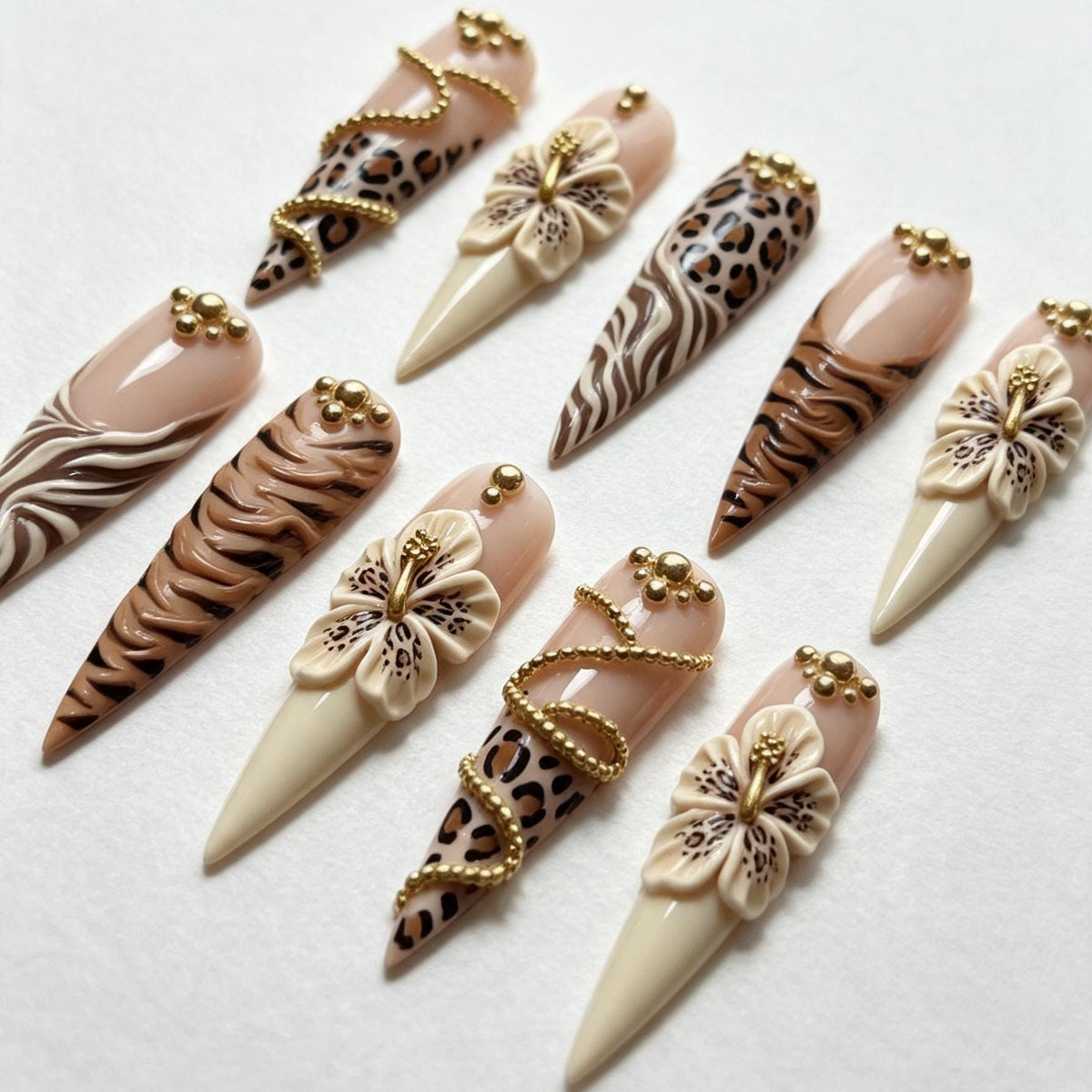 Nude Animal Print Nails With 3D Hibiscus Flowers and Gold Bead Details