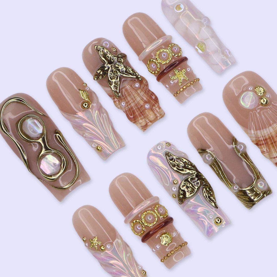 Nude Beige Ocean Nails with Iridescent Shells, Gold Sea-Star Charms and Pearls