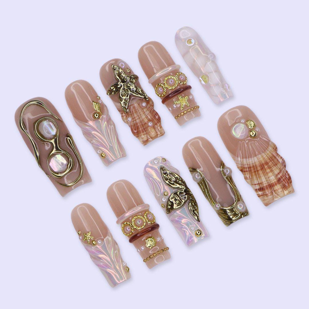 Nude Beige Ocean Nails with Iridescent Shells, Gold Sea-Star Charms and Pearls