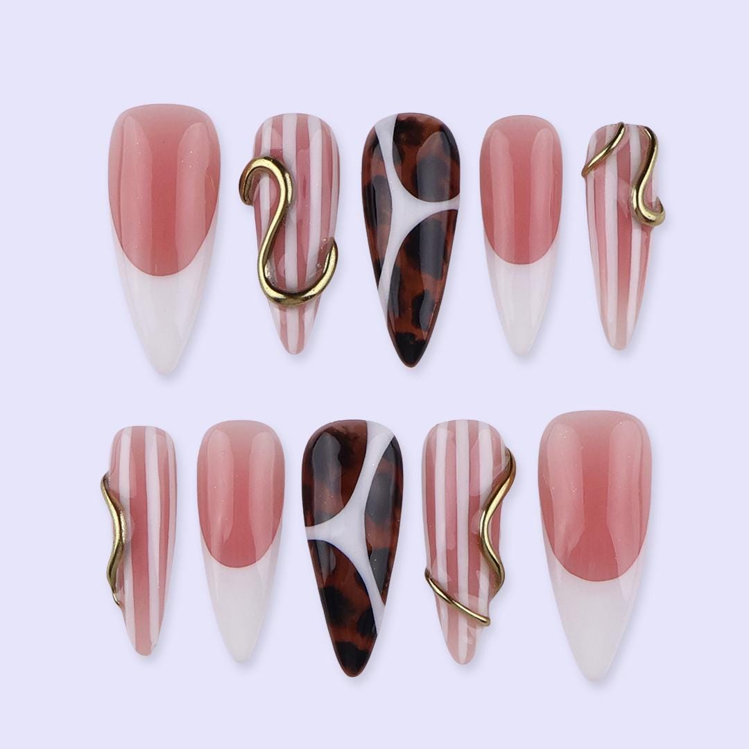 Nude Blush and Tortoiseshell Nails with Stripes and Gold Accents