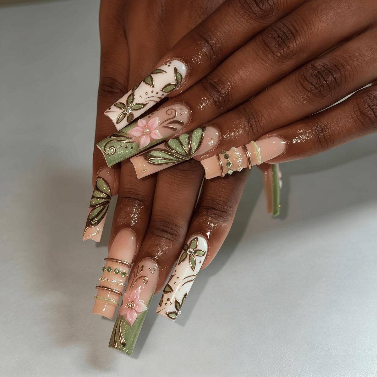 Nude Peach Butterfly Floral Nails With Sage Green, Gold Details and Rhinestones