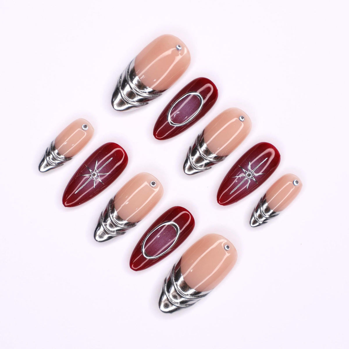 Nude Pink and Burgundy Nails with Silver Chrome Bands and Celestial Details