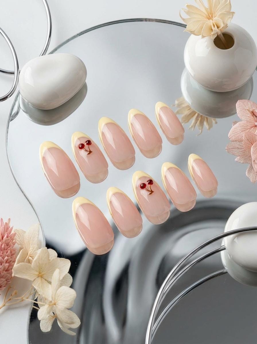 Nude Pink and Buttery Yellow French Tip Nails with 3D Cherries for Summer