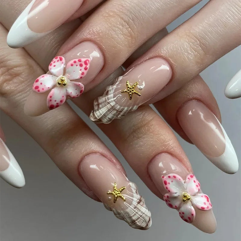 Nude Pink French Tip Nails With Dotted Flowers, Plaid and Gold Starfish Charms