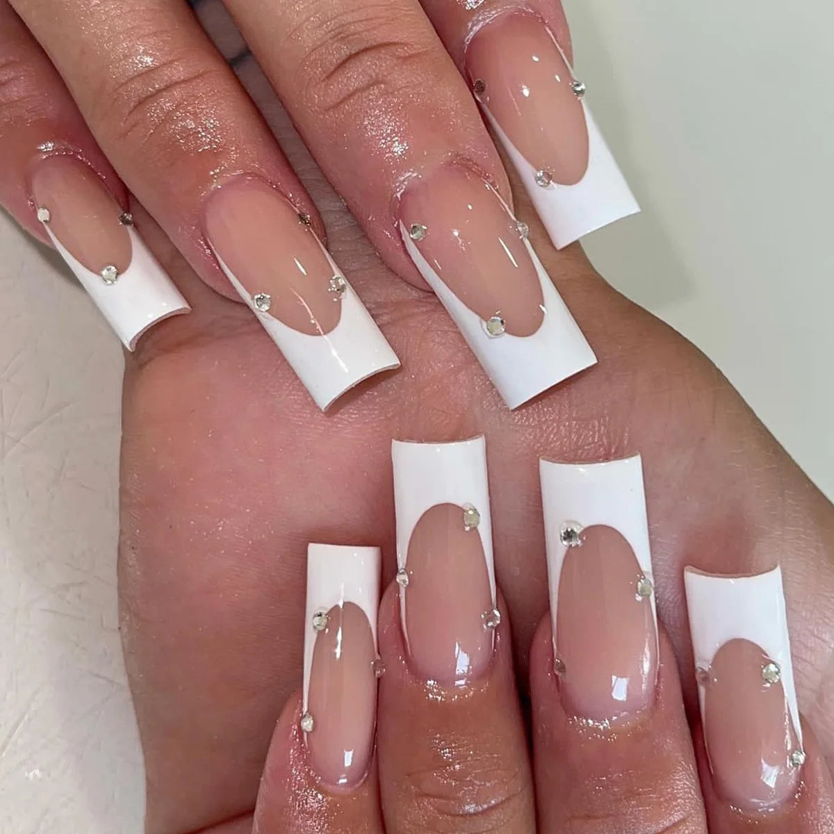 Nude Pink French Tip Press-On Nails With White Tips and Rhinestones